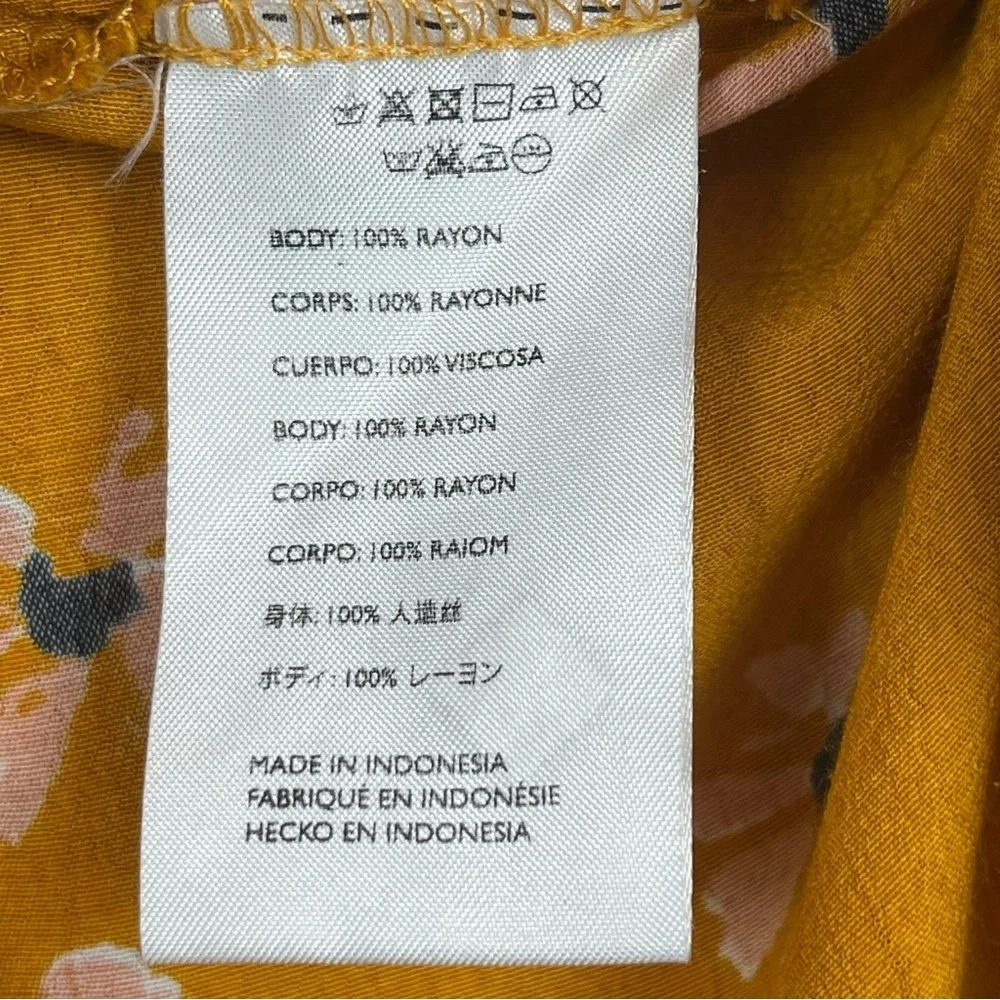 Faithfull The Brand Kamares Botany mustard yellow floral ruffle hem skirt, XS.